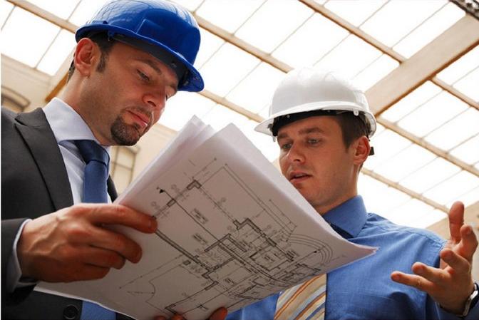 Engineers reviewing site plans